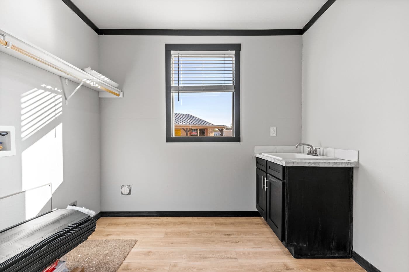 The THE SIERRA Utility Room. This Manufactured Mobile Home features 4 bedrooms and 2 baths.