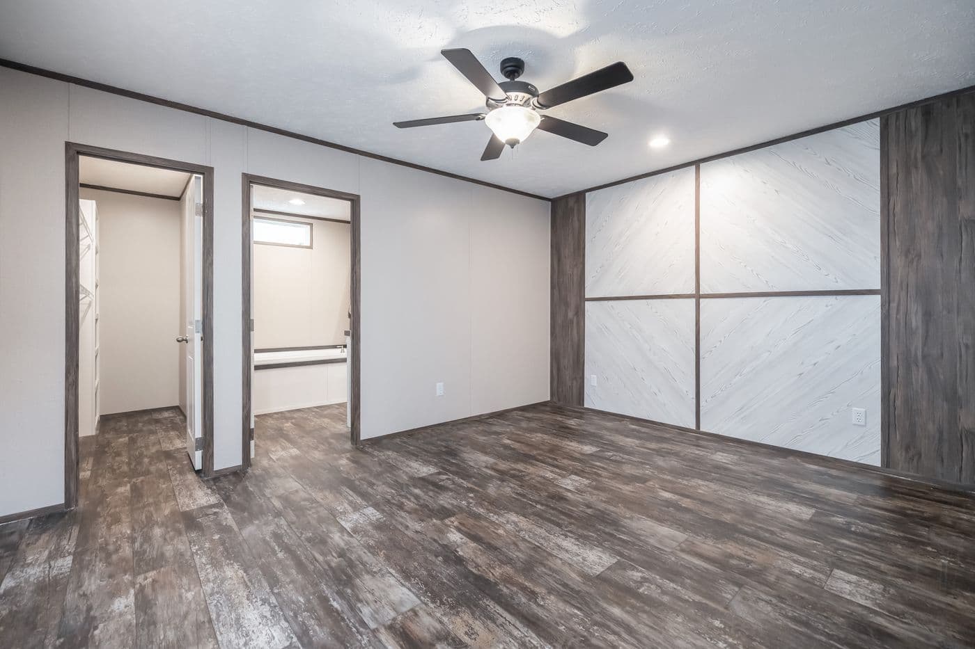 The THE GENERAL Primary Bedroom. This Manufactured Mobile Home features 3 bedrooms and 2 baths.