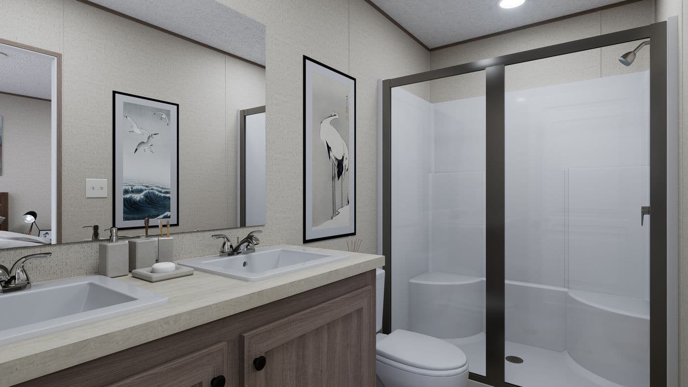 The FOOTHILLS 66 Primary Bathroom. This Manufactured Mobile Home features 3 bedrooms and 2 baths.