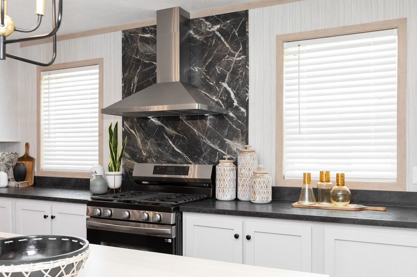 The 6032-5700 THE PULSE Kitchen. This Manufactured Mobile Home features 3 bedrooms and 2 baths.