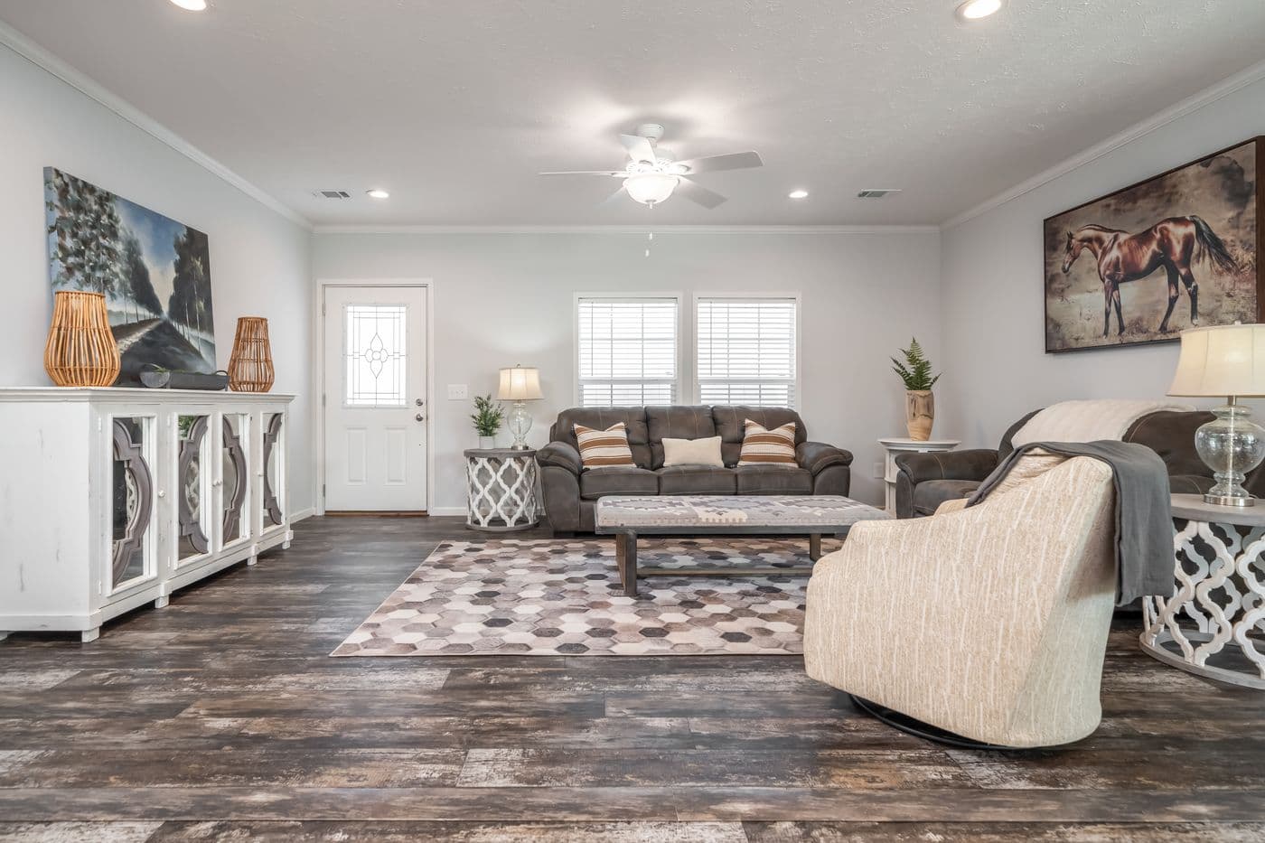 The THE HEWITT Living Room. This Manufactured Mobile Home features 4 bedrooms and 3 baths.