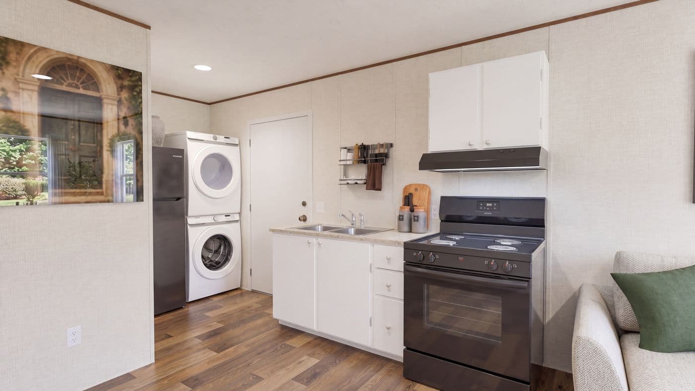 The BUTTERCUP Kitchen. This Manufactured Mobile Home features 1 bedroom and 1 bath.