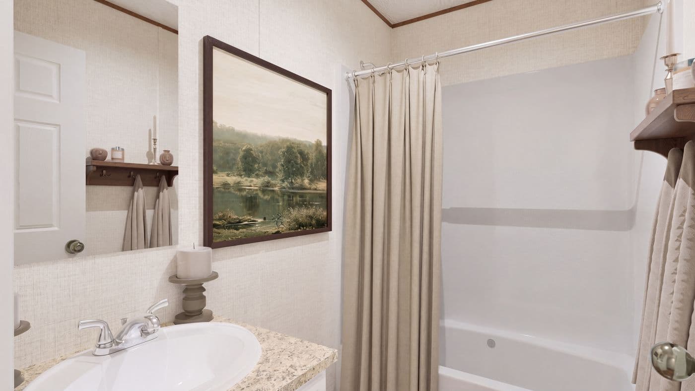 The TULIP Primary Bathroom. This Manufactured Mobile Home features 2 bedrooms and 1 bath.