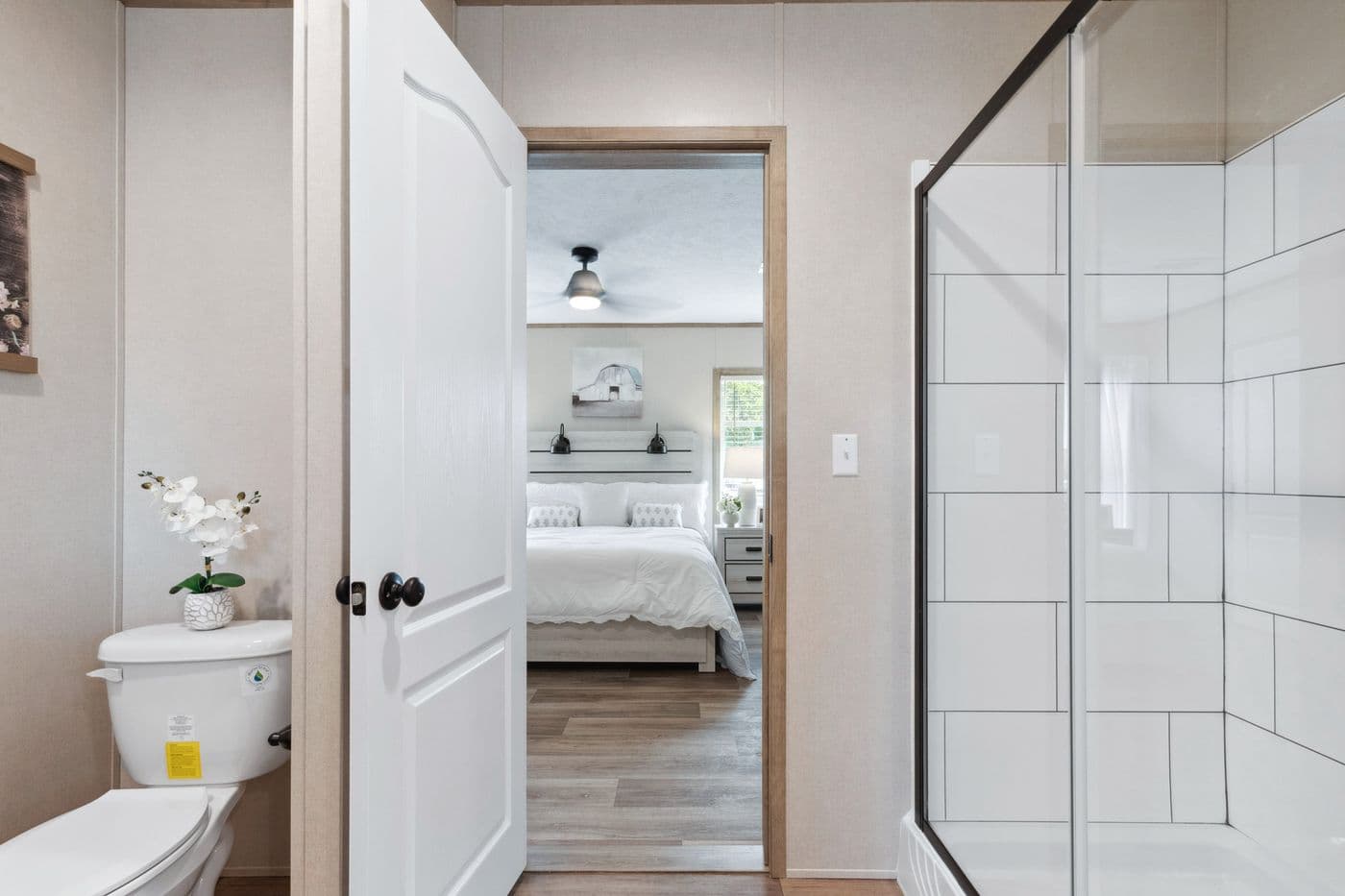 The BREEZE FARMHOUSE 72 Primary Bathroom. This Manufactured Mobile Home features 4 bedrooms and 2 baths.