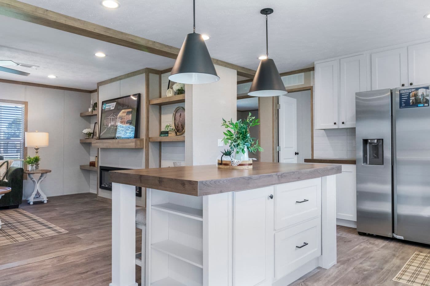 The THE BIG DEAL 52 Kitchen. This Manufactured Mobile Home features 3 bedrooms and 2 baths.