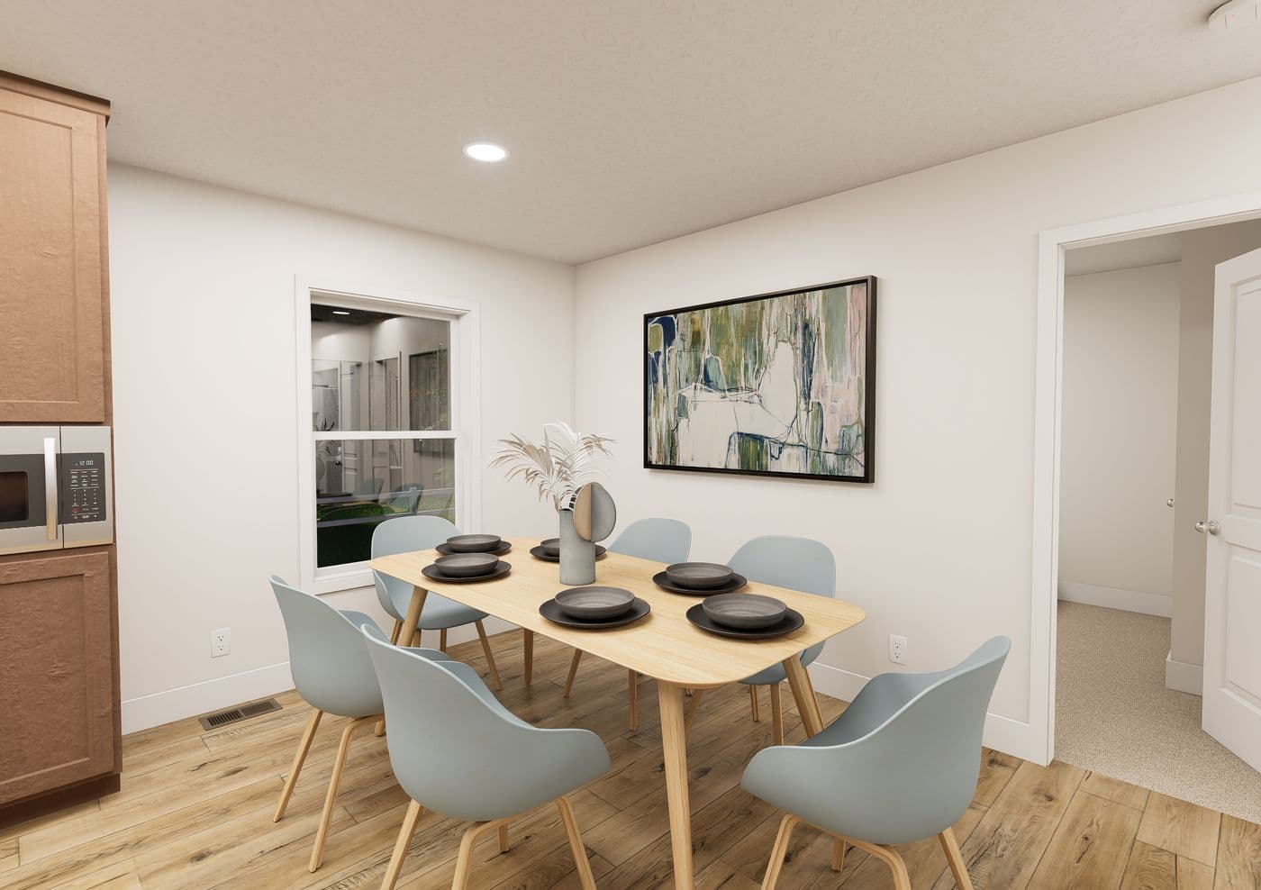 The ANNIVERSARY 2848 Dining Room. This Manufactured Mobile Home features 3 bedrooms and 2 baths.