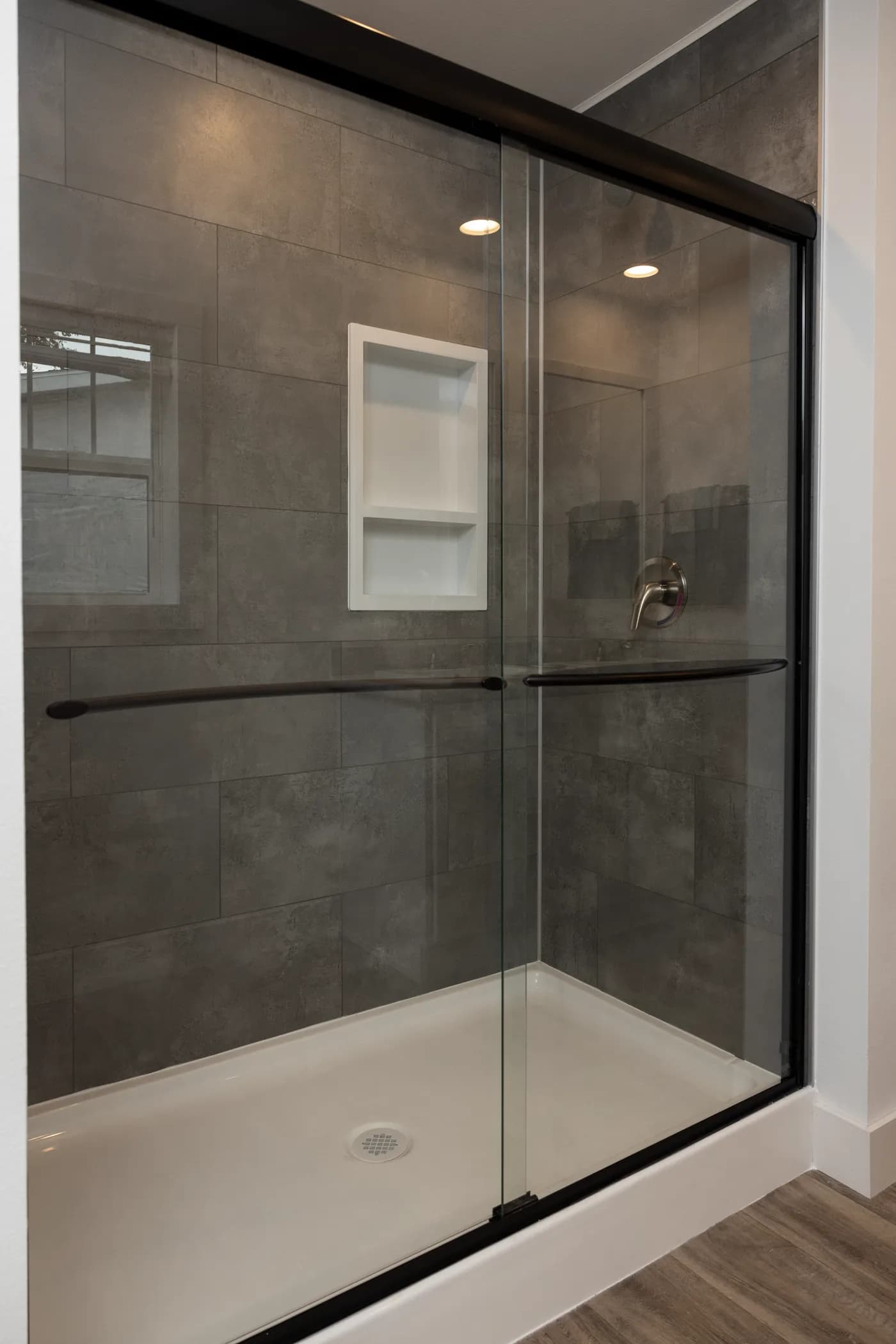 The HEY JUDE Primary Bathroom. This Manufactured Mobile Home features 4 bedrooms and 2 baths.