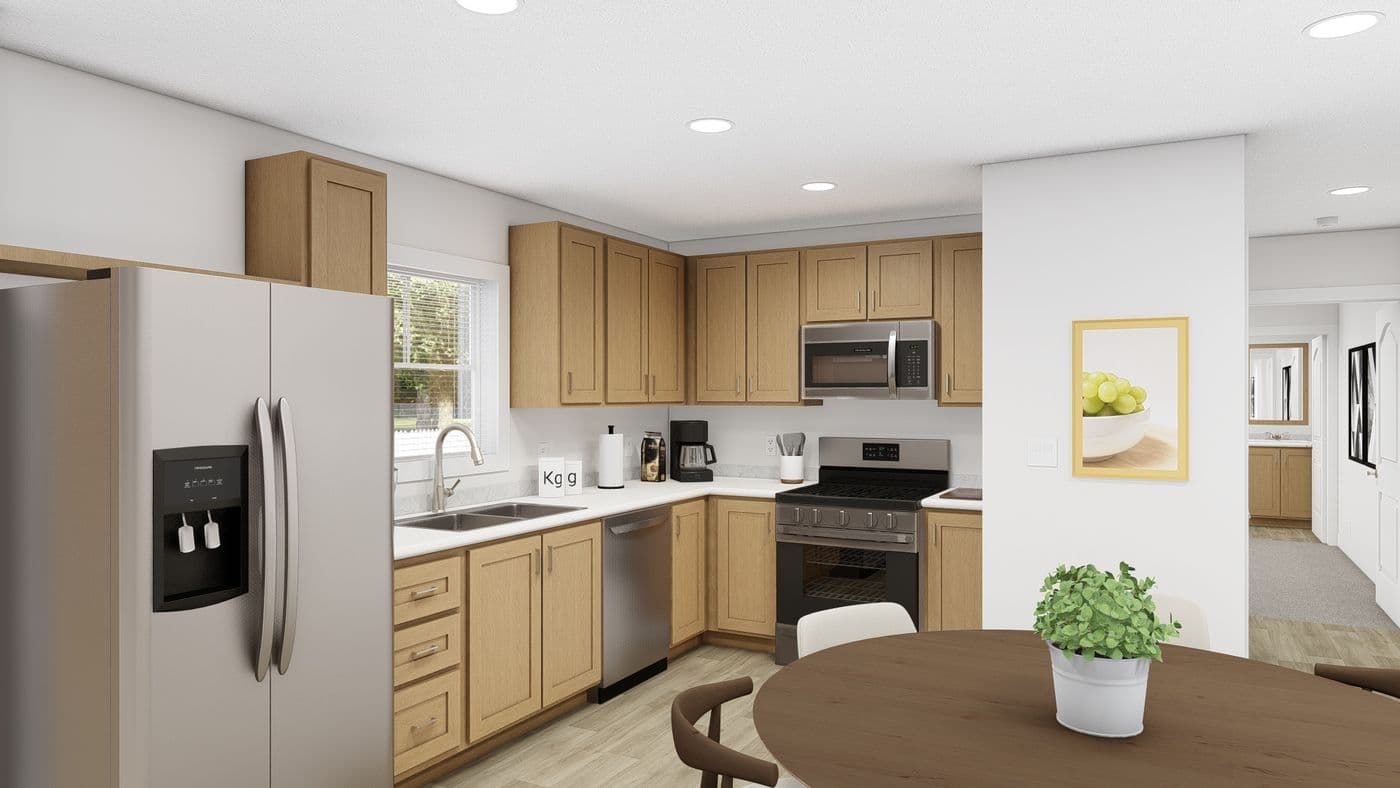 The RAMSEY 218-1 Kitchen. This Manufactured Mobile Home features 3 bedrooms and 2 baths.