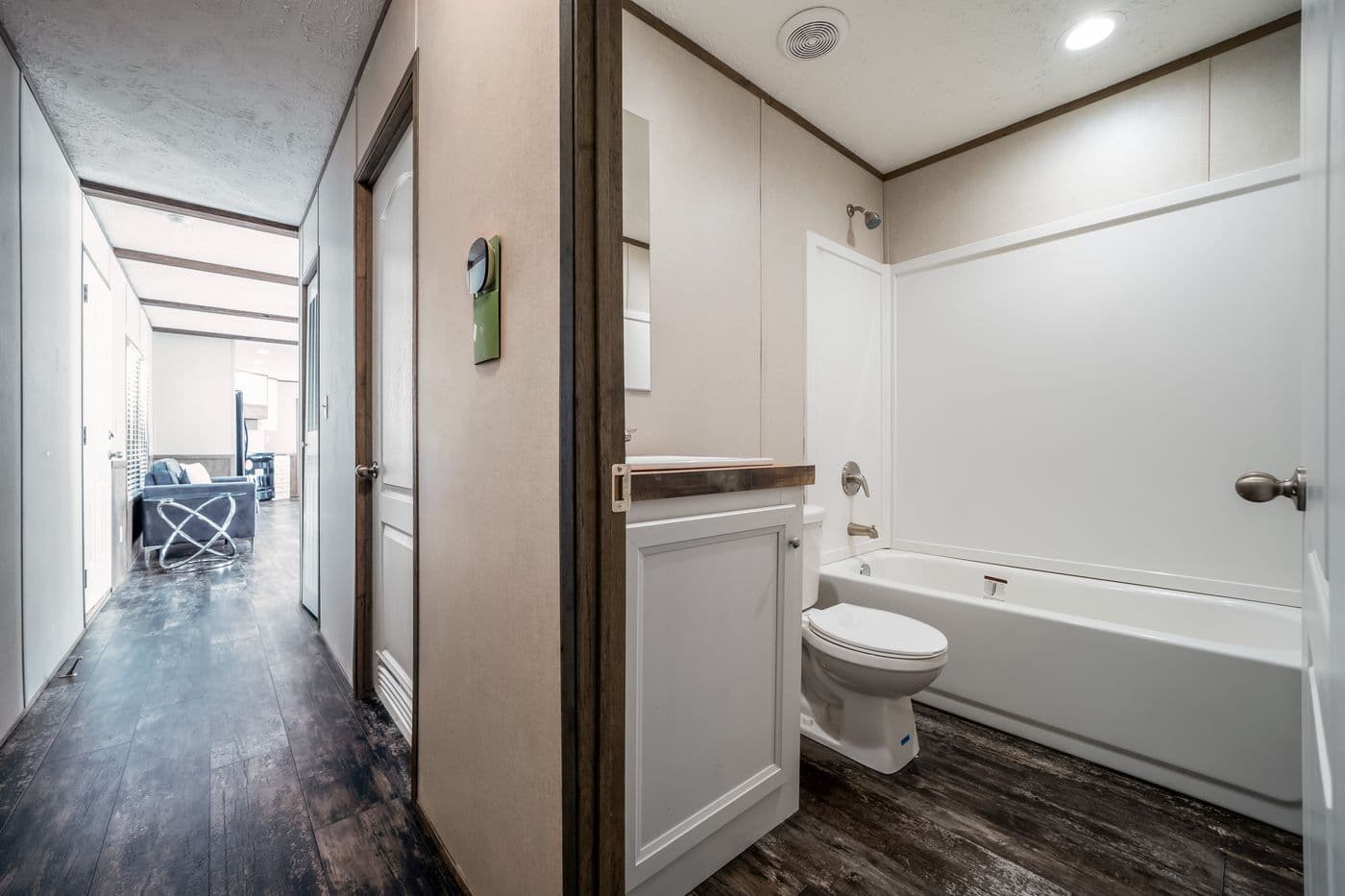 The ANNIVERSARY ENTERTAINER Exterior. This Manufactured Mobile Home features 3 bedrooms and 2 baths.