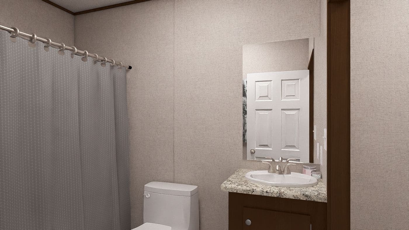 The OAK Guest Bathroom. This Manufactured Mobile Home features 4 bedrooms and 2 baths.