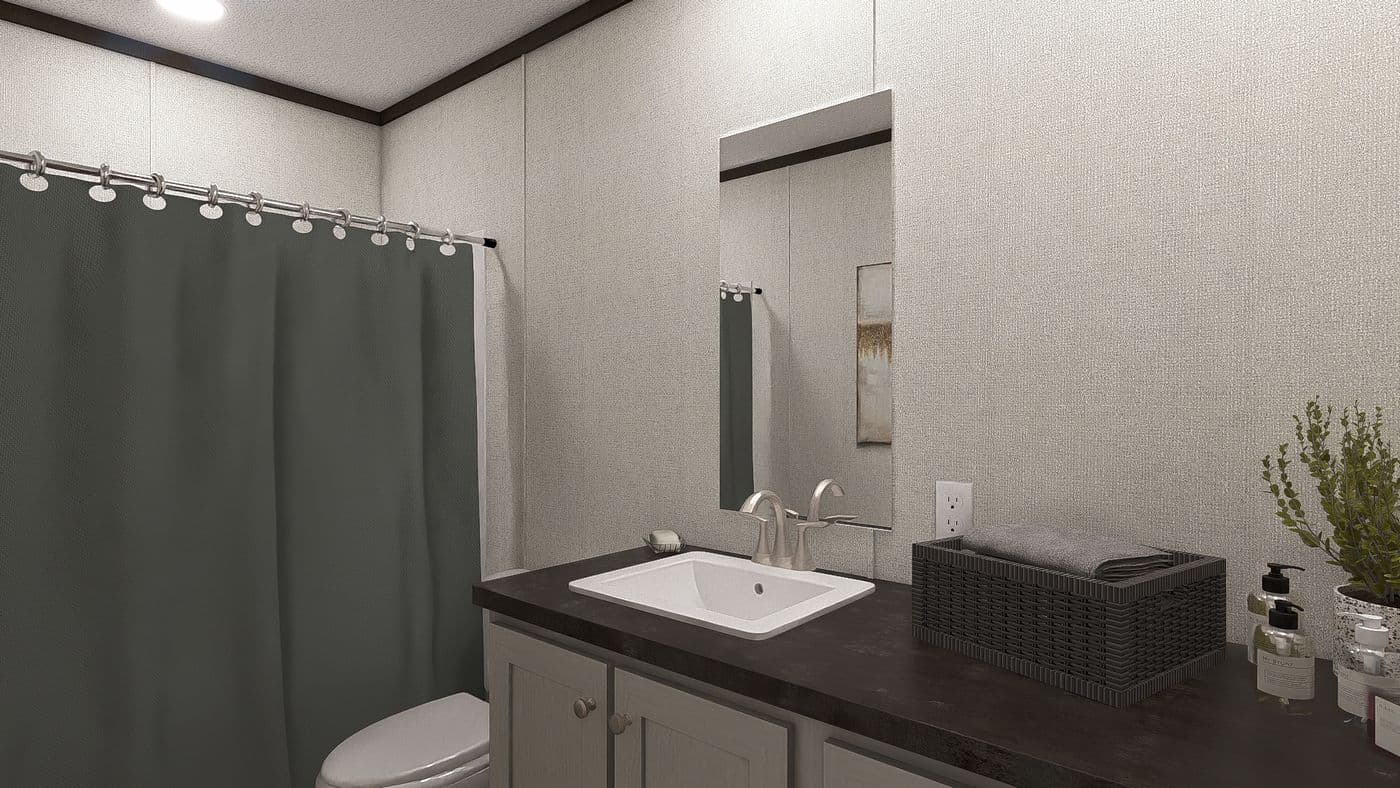 The DISCOVER Guest Bathroom. This Manufactured Mobile Home features 3 bedrooms and 2 baths.