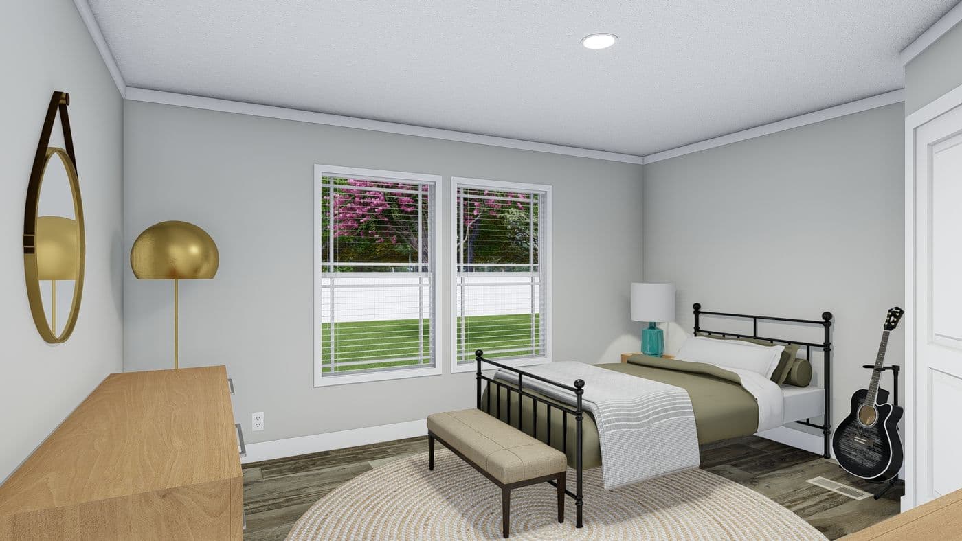 The CASTLE PINES Bedroom. This Manufactured Mobile Home features 3 bedrooms and 2 baths.