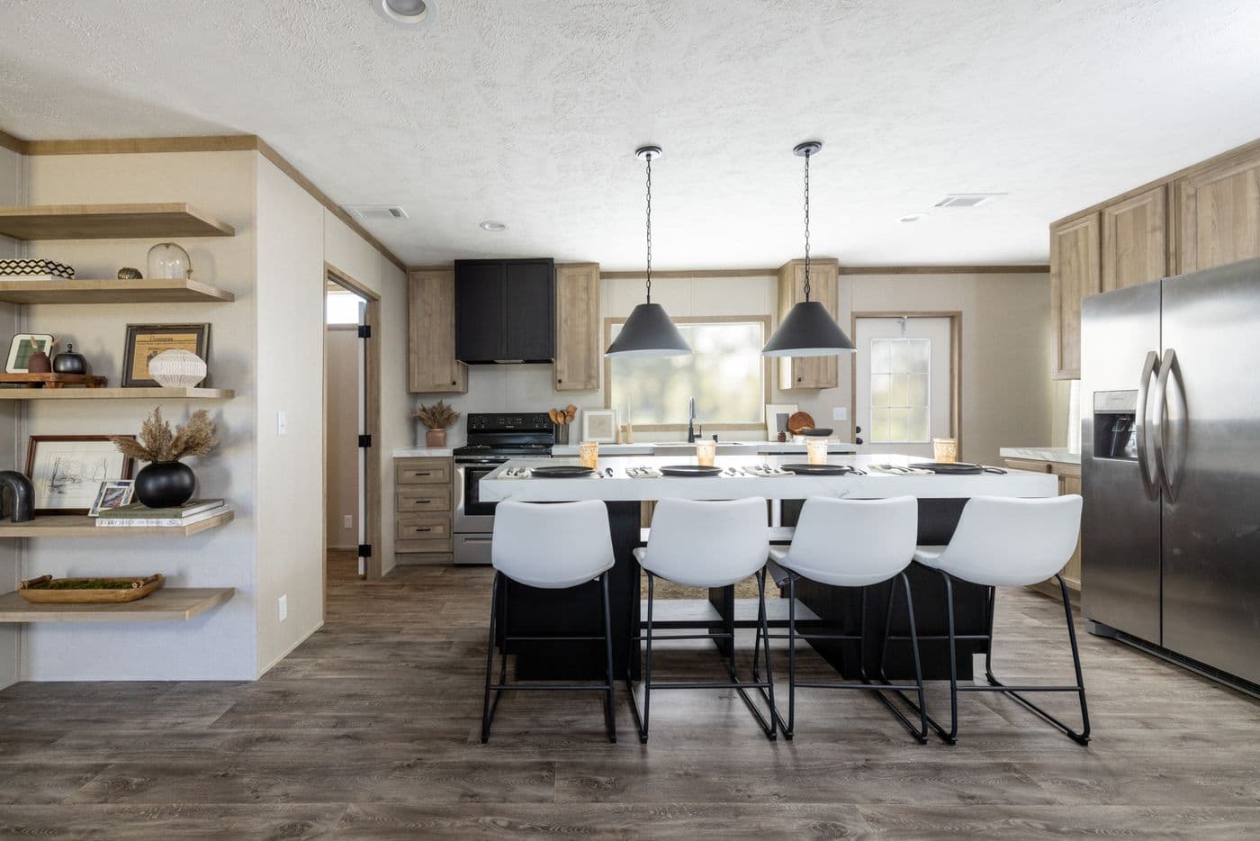 The STERLING ANNIVERSARY Kitchen. This Manufactured Mobile Home features 3 bedrooms and 2 baths.