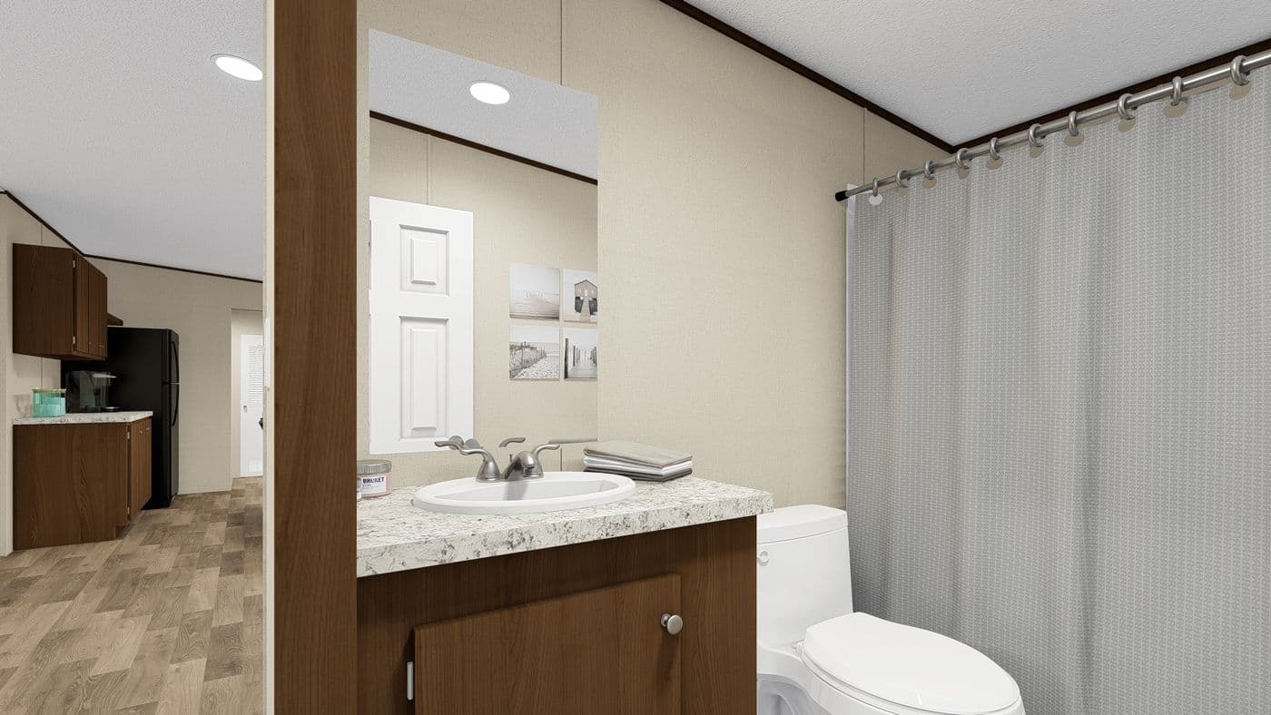 The THRILL Guest Bathroom. This Manufactured Mobile Home features 3 bedrooms and 2 baths.