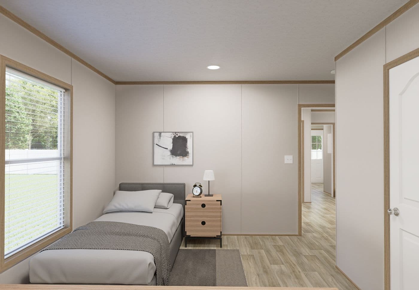 The THE MOUNTAINEER 72 Guest Bedroom. This Manufactured Mobile Home features 3 bedrooms and 2 baths.