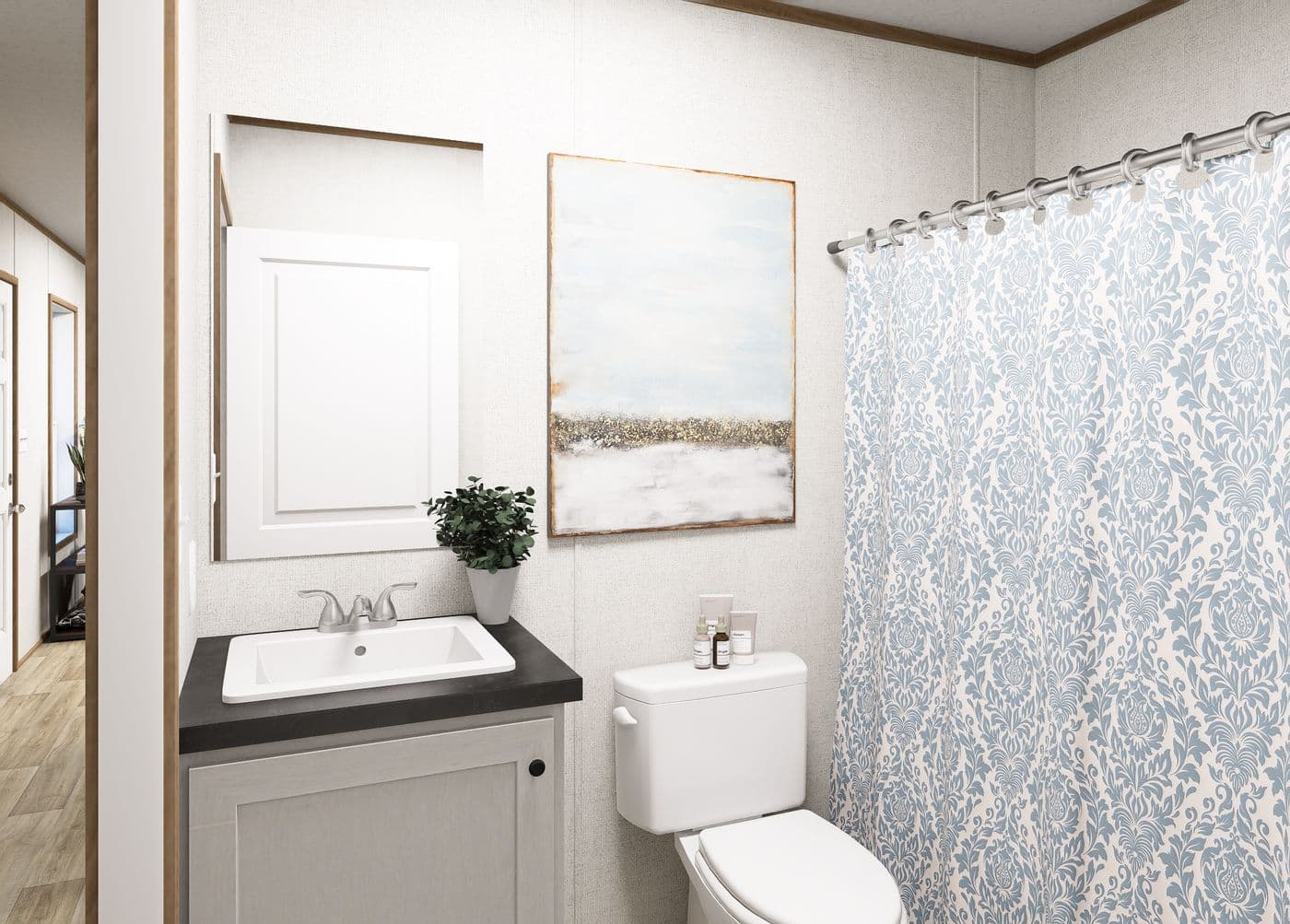The BEACON  16X66 Guest Bathroom. This Manufactured Mobile Home features 3 bedrooms and 2 baths.