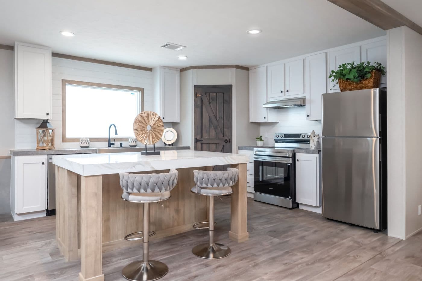 The PT 78 Kitchen. This Manufactured Mobile Home features 3 bedrooms and 2 baths.