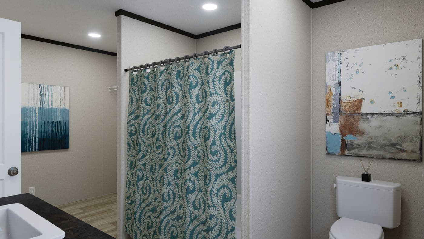The THE SPARK Bedroom. This Manufactured Mobile Home features 3 bedrooms and 2 baths.