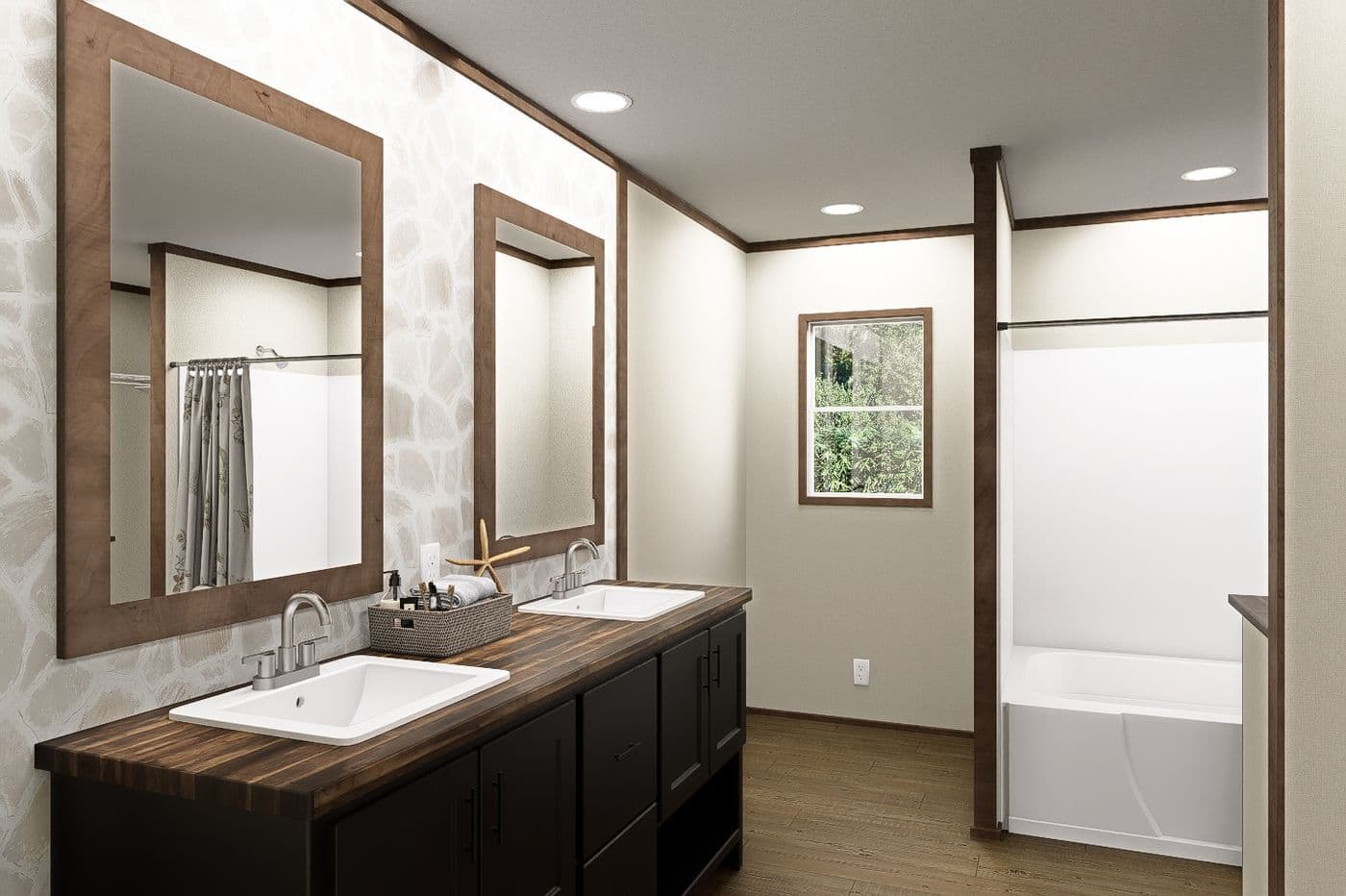 The SNOWCAP Primary Bathroom. This Manufactured Mobile Home features 4 bedrooms and 2.5 baths.