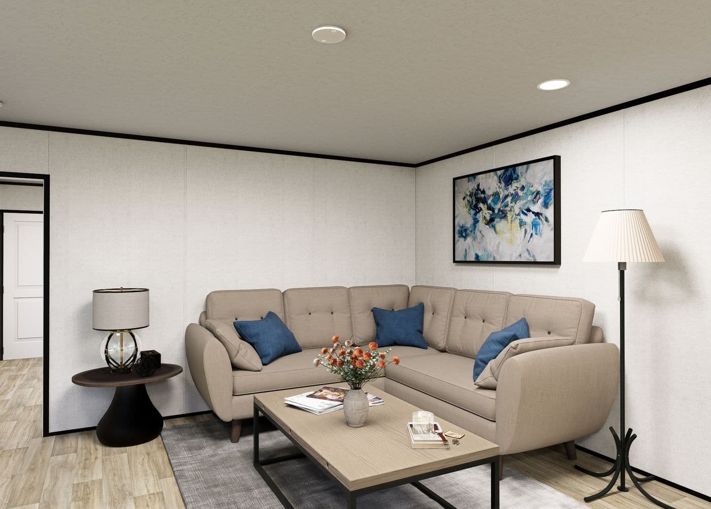The LUMEN Living Room. This Manufactured Mobile Home features 3 bedrooms and 2 baths.