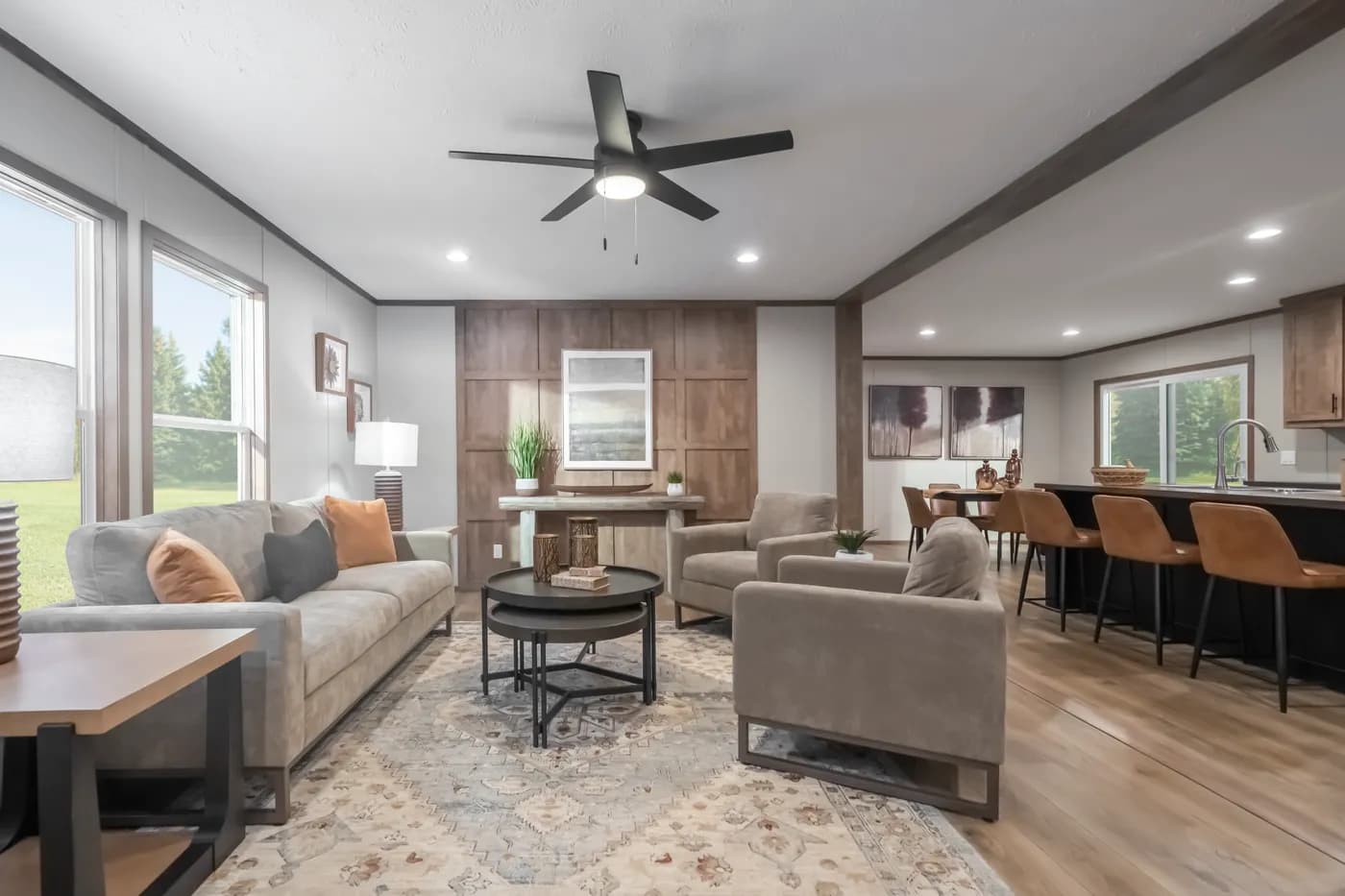 The SEVIER Living Room. This Manufactured Mobile Home features 4 bedrooms and 3 baths.