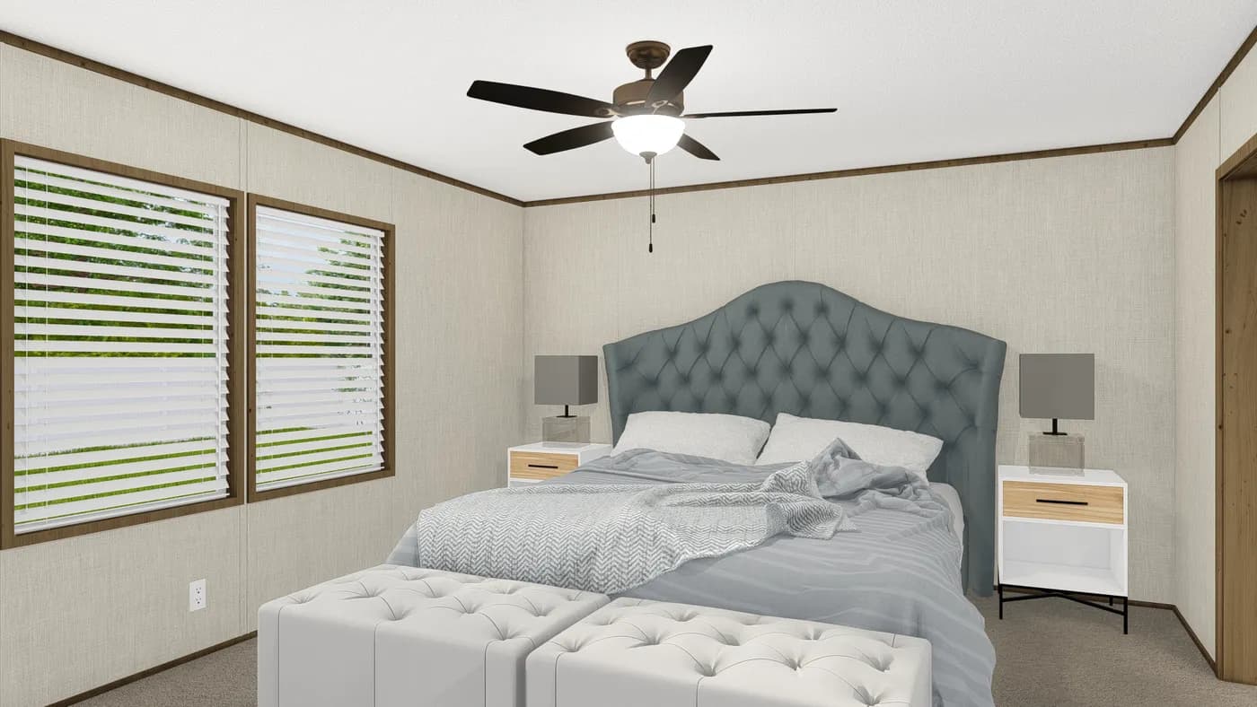The GRAND LIVING 64 Primary Bedroom. This Manufactured Mobile Home features 3 bedrooms and 2 baths.