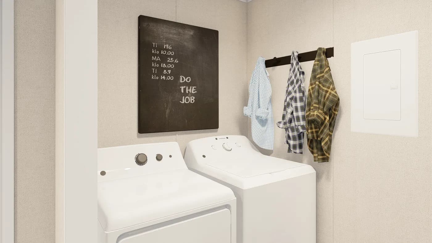 The GRAND LIVING 76B Utility Room. This Manufactured Mobile Home features 3 bedrooms and 2 baths.