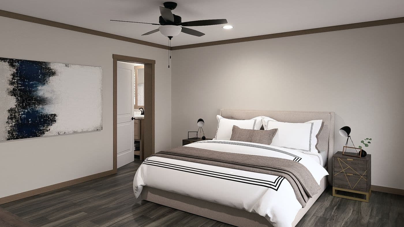 The LIZZIE ELITE Primary Bedroom. This Manufactured Mobile Home features 3 bedrooms and 2 baths.