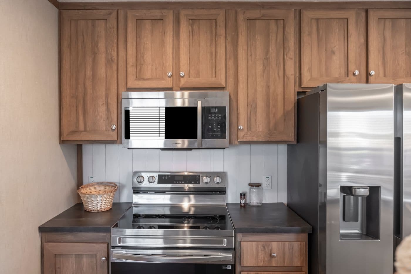 The SEAS THE DAY Kitchen. This Manufactured Mobile Home features 3 bedrooms and 2 baths.