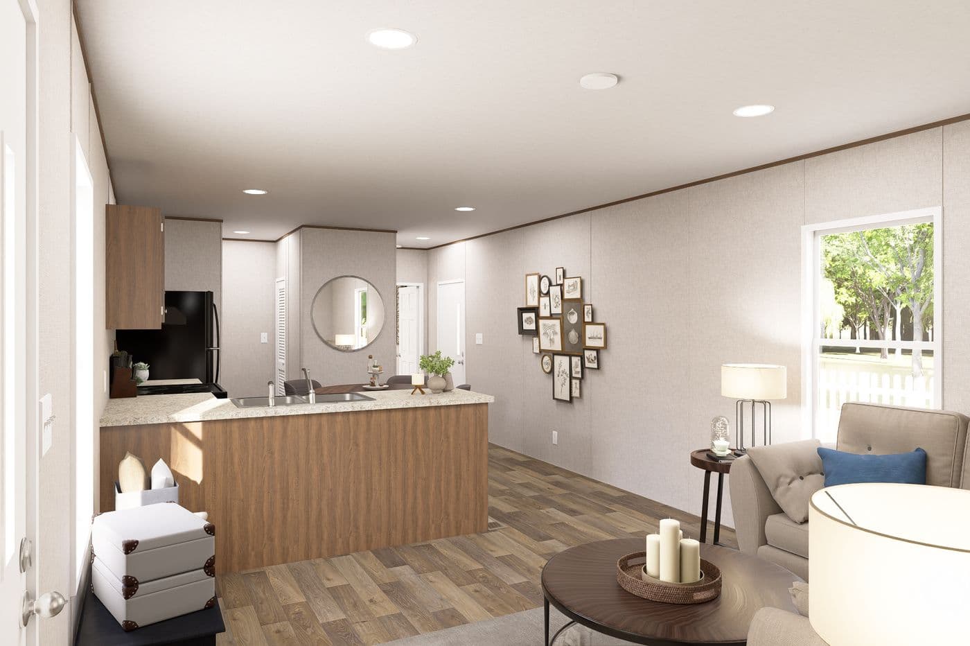 The HICKORY Living Room. This Manufactured Mobile Home features 3 bedrooms and 2 baths.