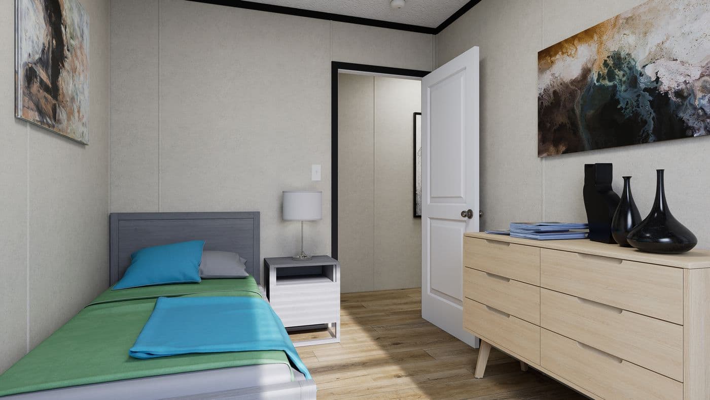 The 7616-CC03 HARBORVIEW 76 Guest Bedroom. This Manufactured Mobile Home features 3 bedrooms and 2 baths.