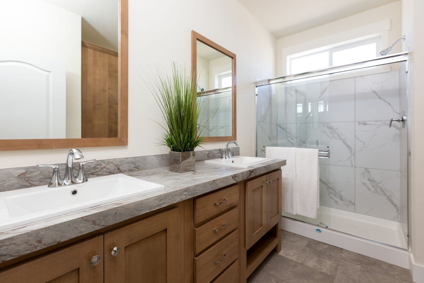 The CORONADO 24563C Primary Bathroom. This Manufactured Mobile Home features 3 bedrooms and 2 baths.