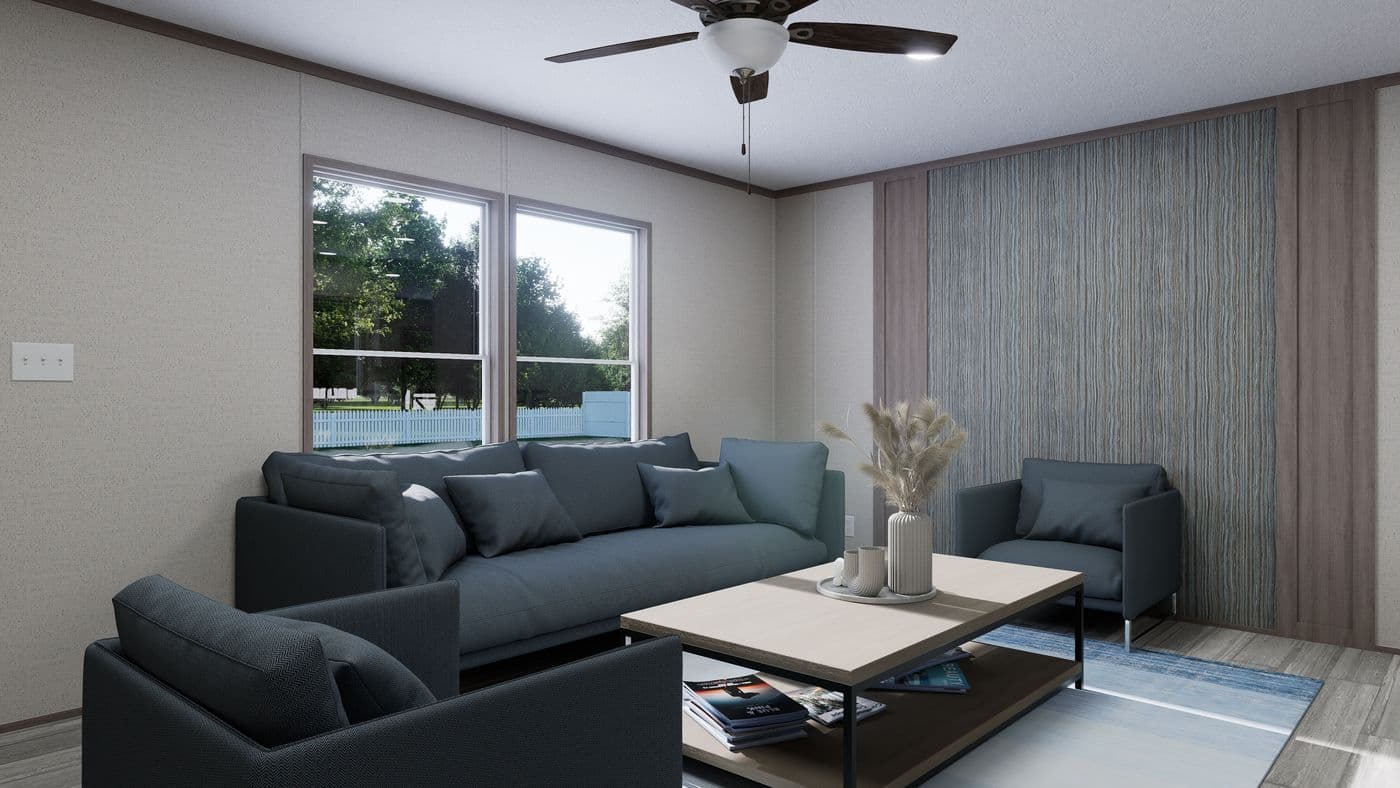 The THE MOUNTAINEER 60 Living Room. This Manufactured Mobile Home features 3 bedrooms and 2 baths.
