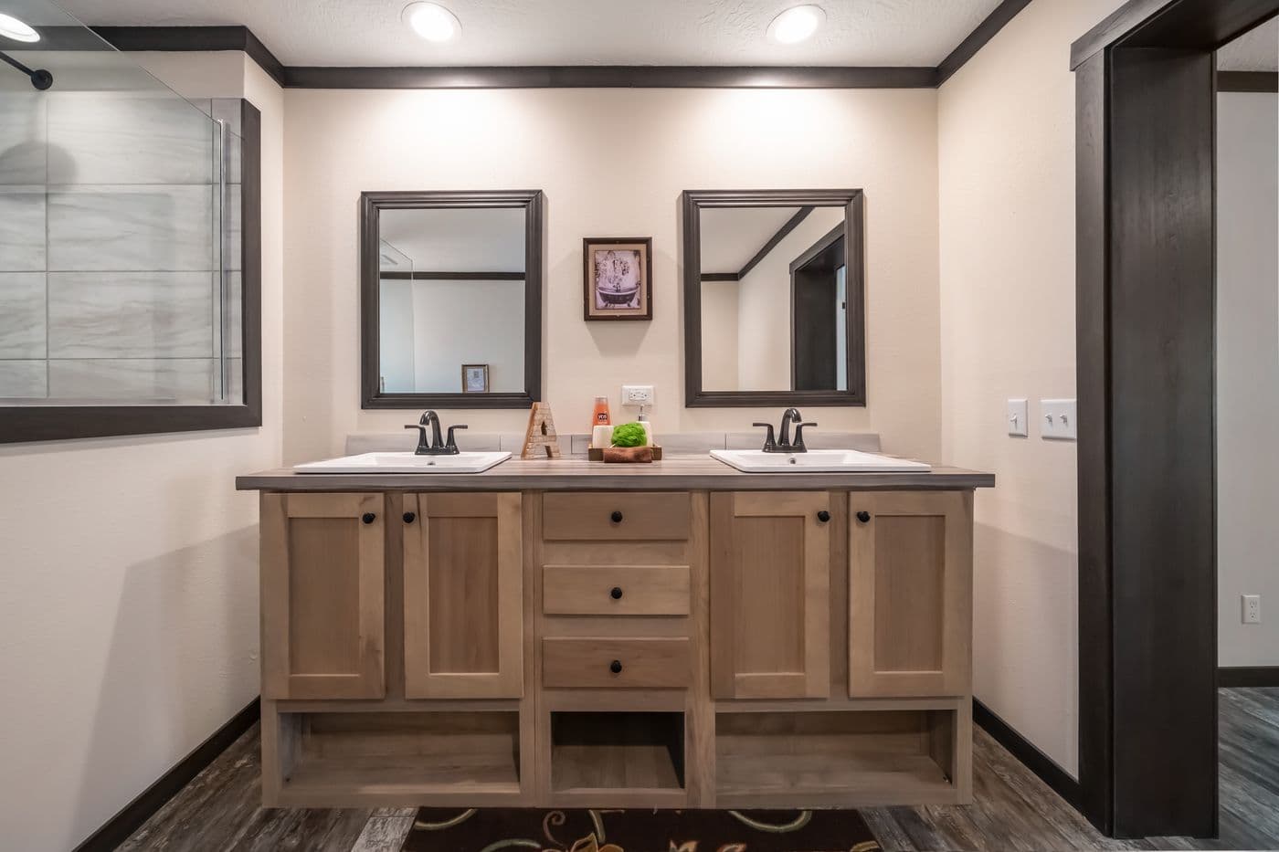 The BOUJEE 2 Primary Bathroom. This Manufactured Mobile Home features 3 bedrooms and 2 baths.