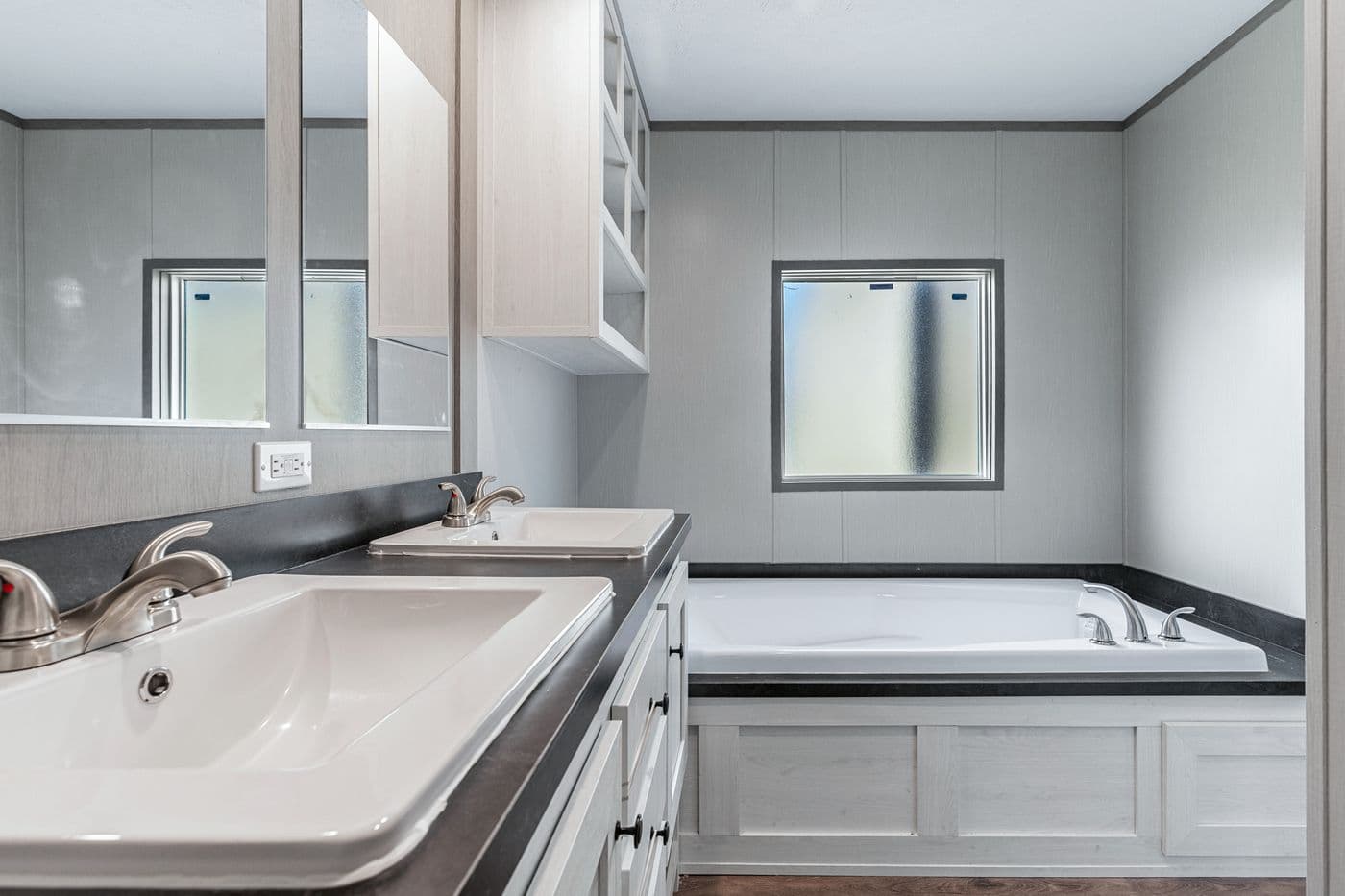 The RESOLUTION 16763H Primary Bathroom. This Manufactured Mobile Home features 3 bedrooms and 2 baths.