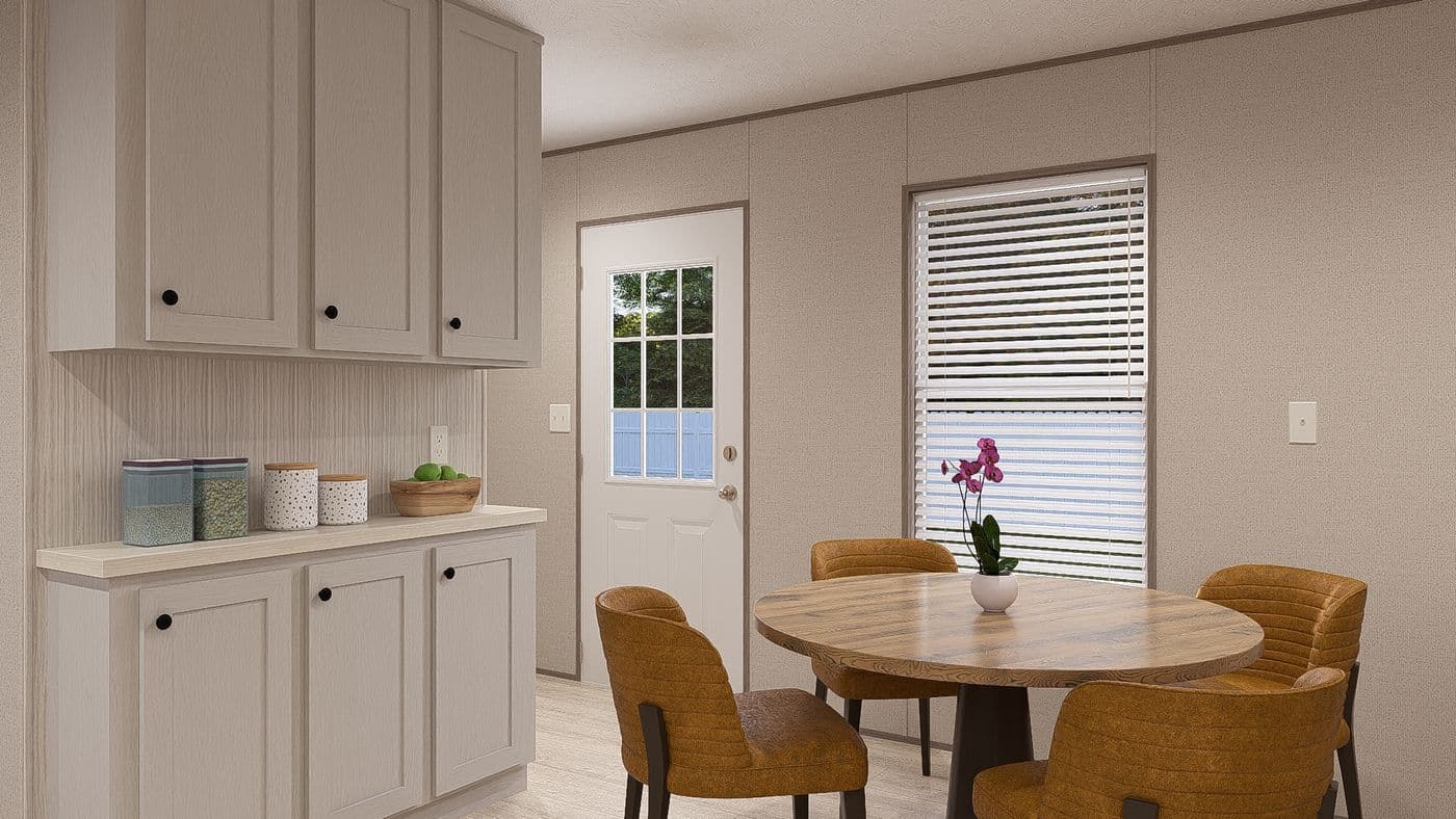 The BLAZER 56 B Dining Room. This Manufactured Mobile Home features 2 bedrooms and 2 baths.