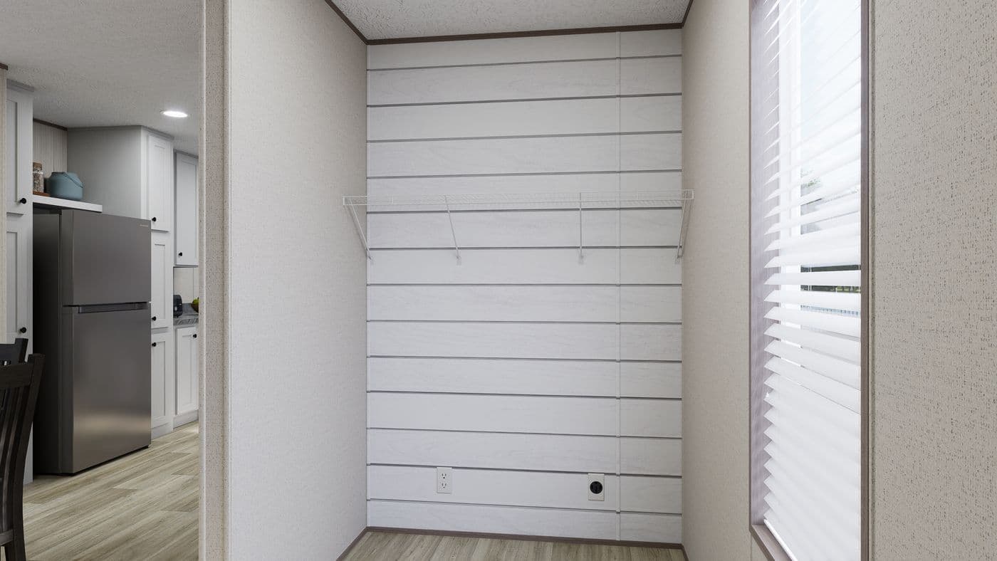 The ROCKY VALLEY Utility Room. This Manufactured Mobile Home features 3 bedrooms and 2 baths.