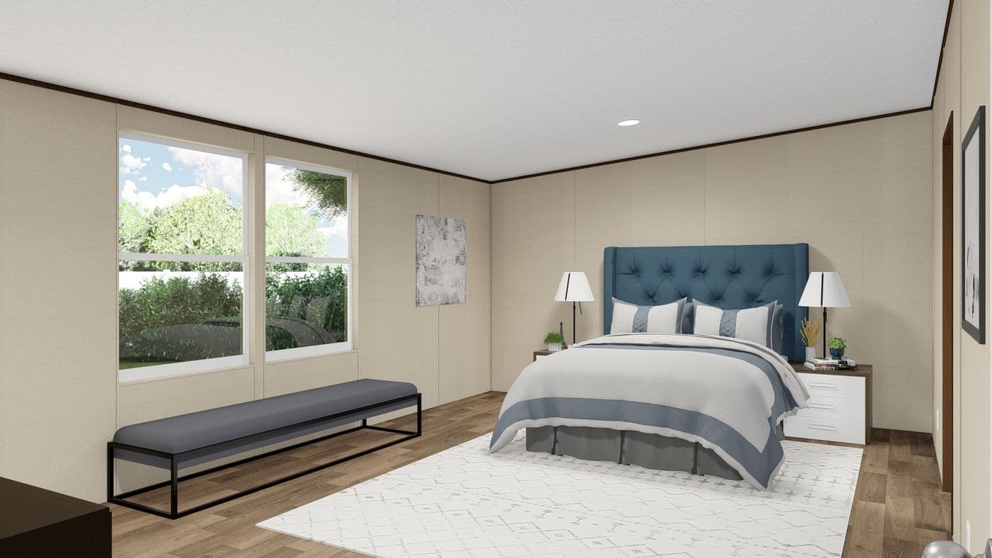 The TRIUMPH Primary Bedroom. This Manufactured Mobile Home features 5 bedrooms and 3 baths.