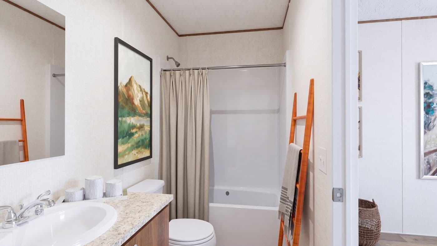 The DOGWOOD Primary Bathroom. This Manufactured Mobile Home features 2 bedrooms and 2 baths.