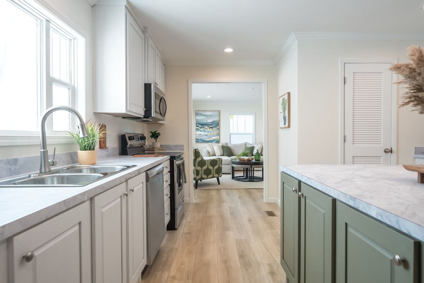 The 5430 "UWHARRIE" 7632 Kitchen. This Manufactured Mobile Home features 4 bedrooms and 2 baths.