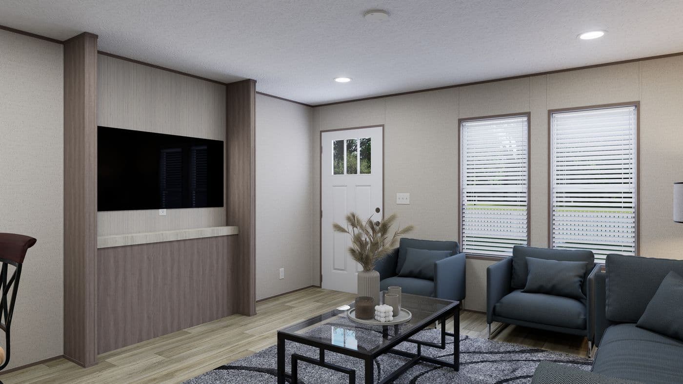 The ROCKY VALLEY Living Room. This Manufactured Mobile Home features 3 bedrooms and 2 baths.