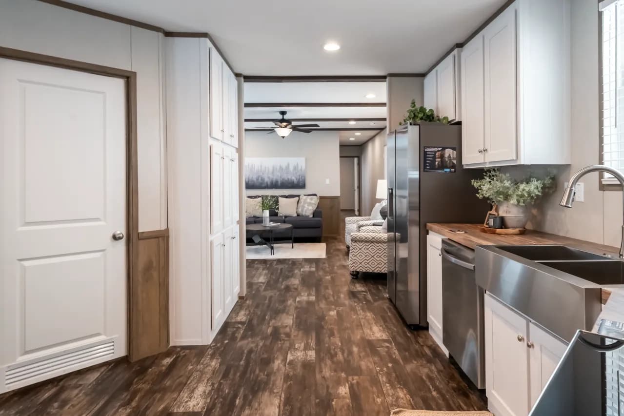 The ANNIVERSARY ENTERTAINER Exterior. This Manufactured Mobile Home features 3 bedrooms and 2 baths.