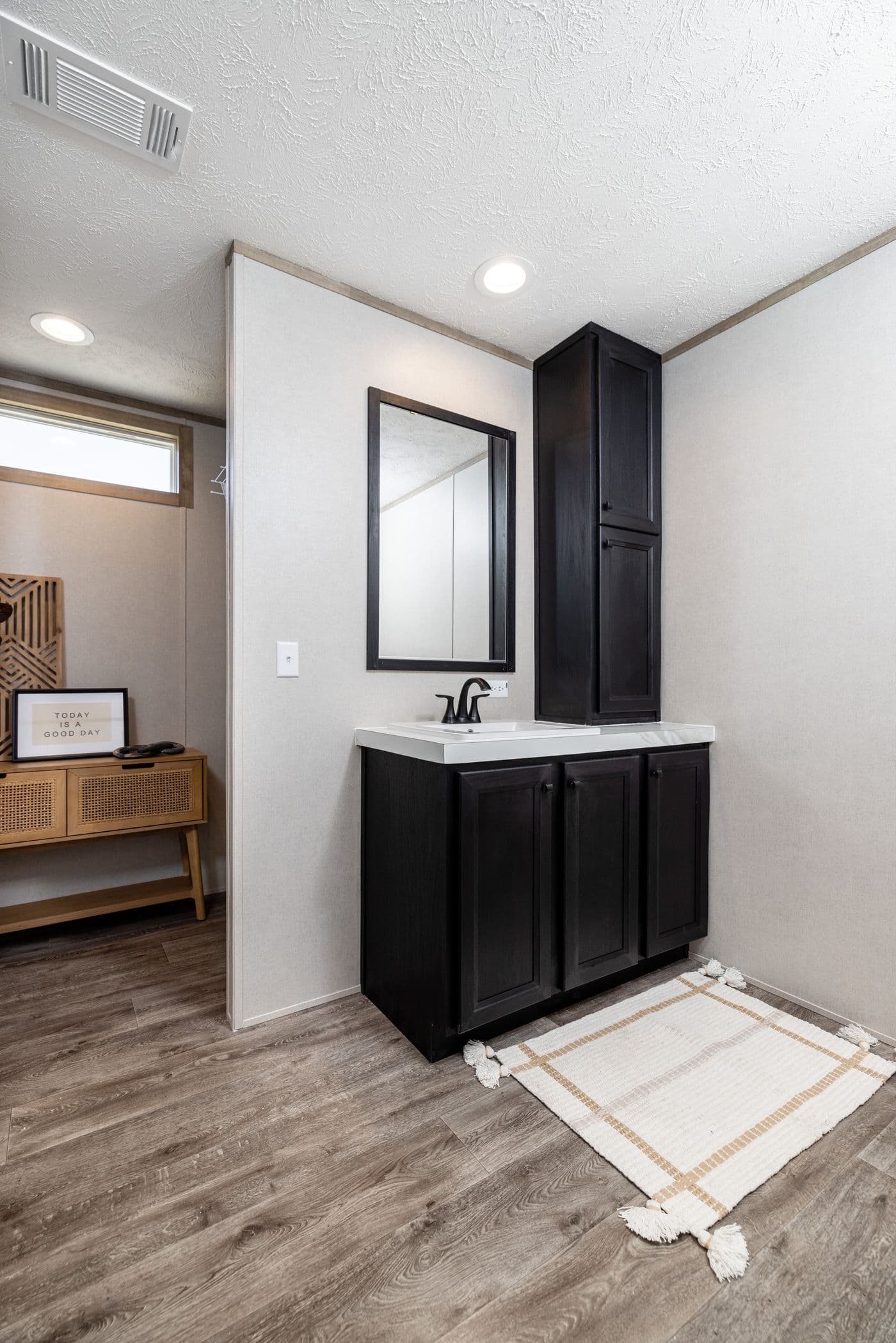The STERLING ANNIVERSARY Primary Bathroom. This Manufactured Mobile Home features 3 bedrooms and 2 baths.
