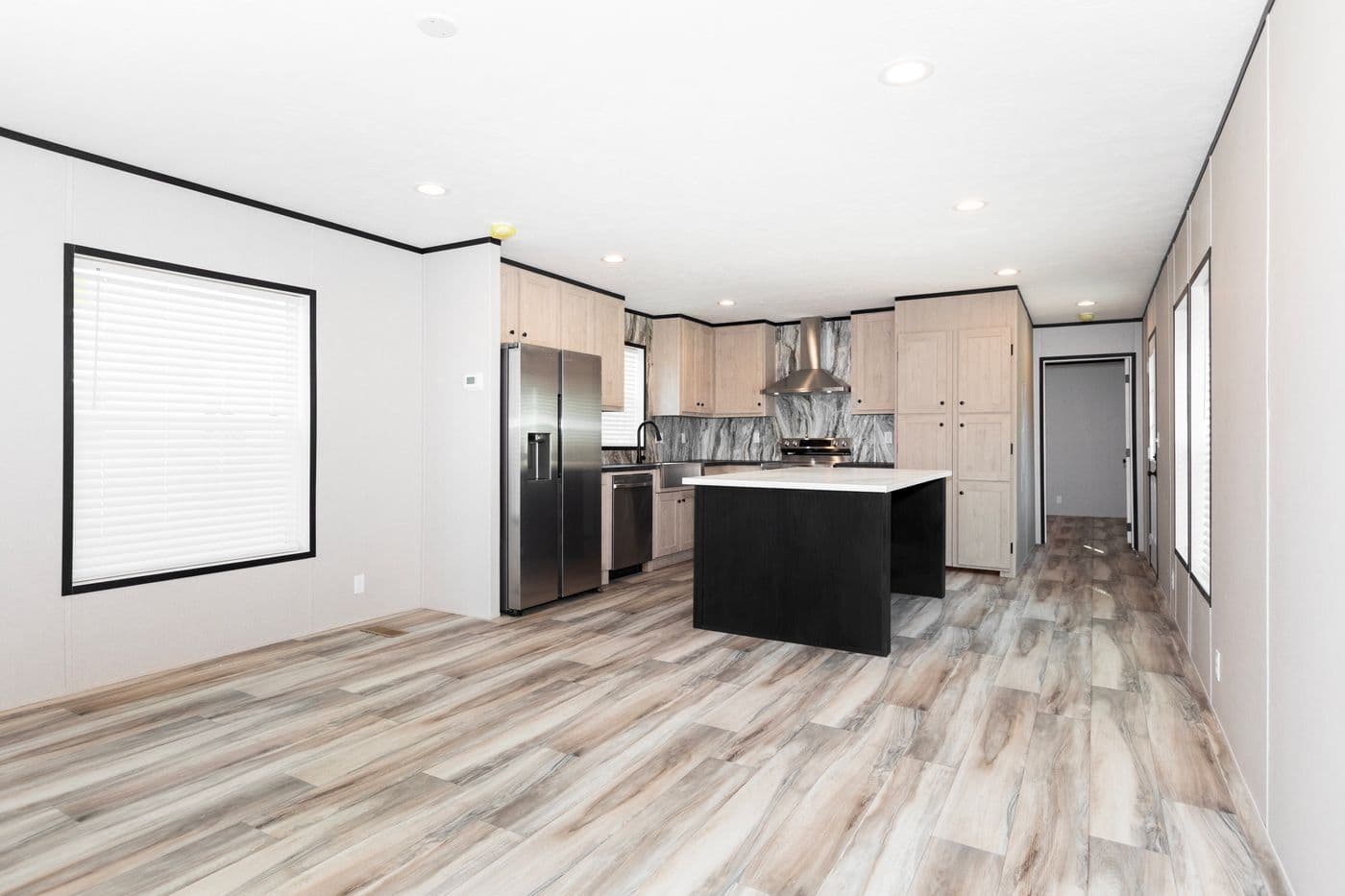 The THE FUJI Living Room. This Manufactured Mobile Home features 3 bedrooms and 2 baths.