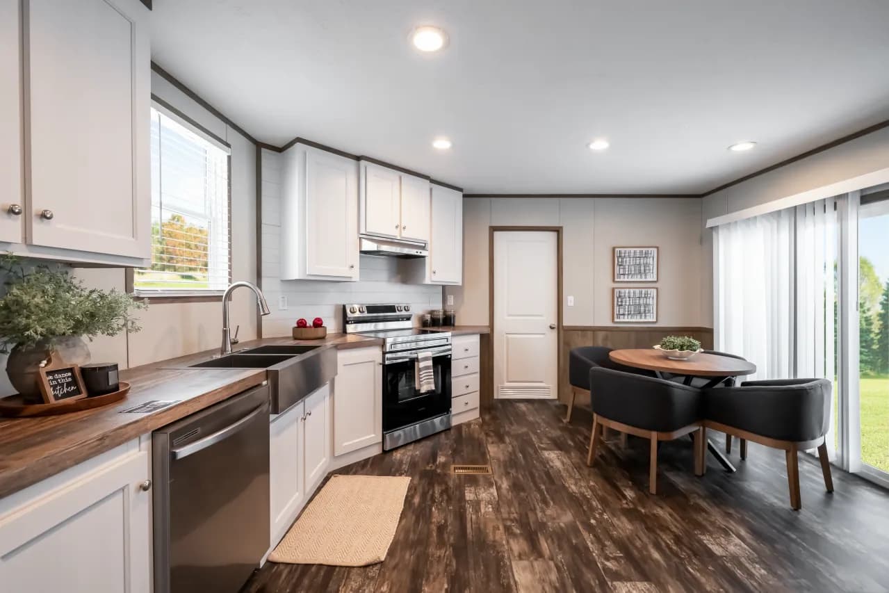 The ANNIVERSARY ENTERTAINER Exterior. This Manufactured Mobile Home features 3 bedrooms and 2 baths.