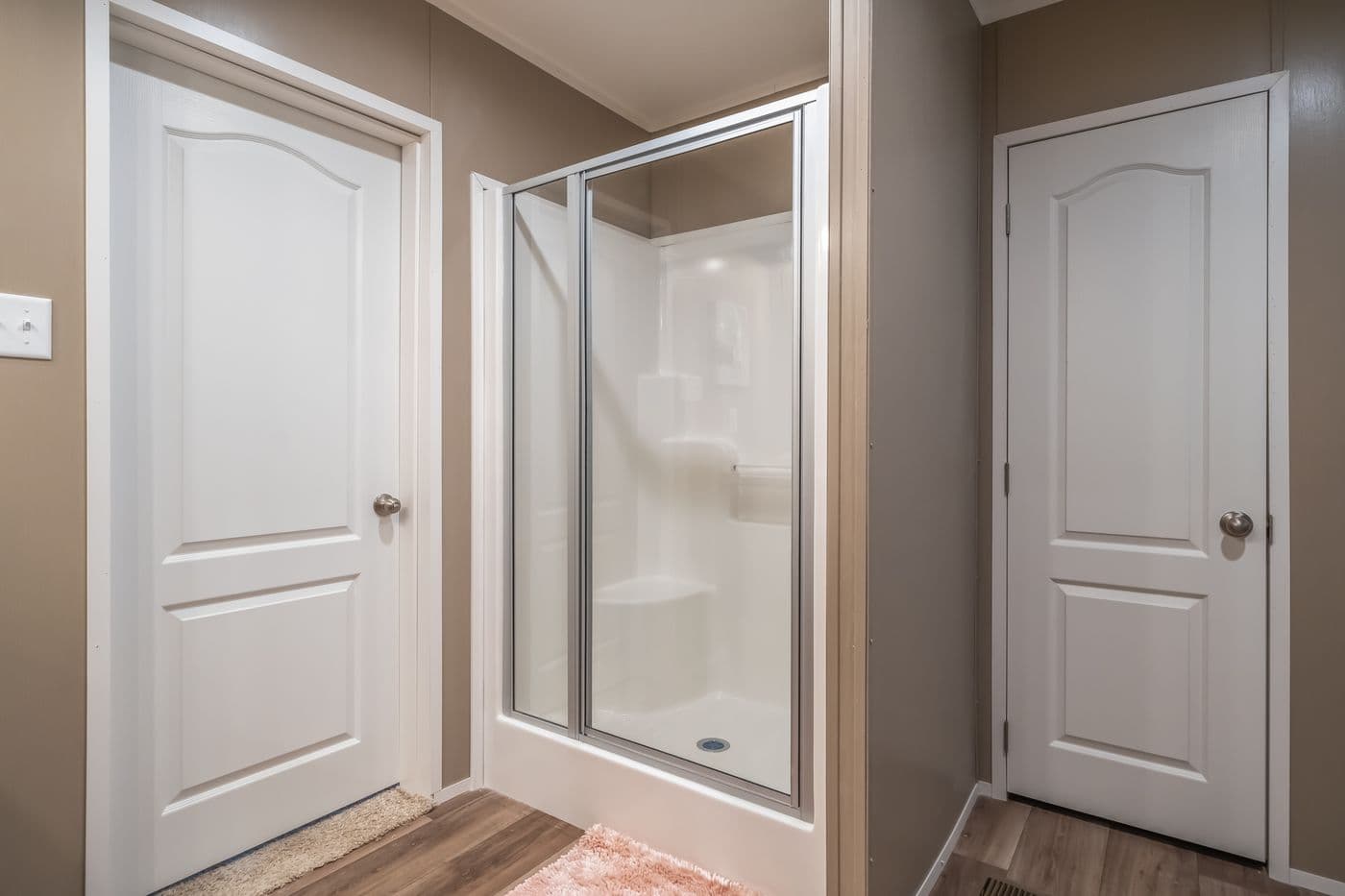 The TRADITION 56D Primary Bathroom. This Manufactured Mobile Home features 3 bedrooms and 2 baths.