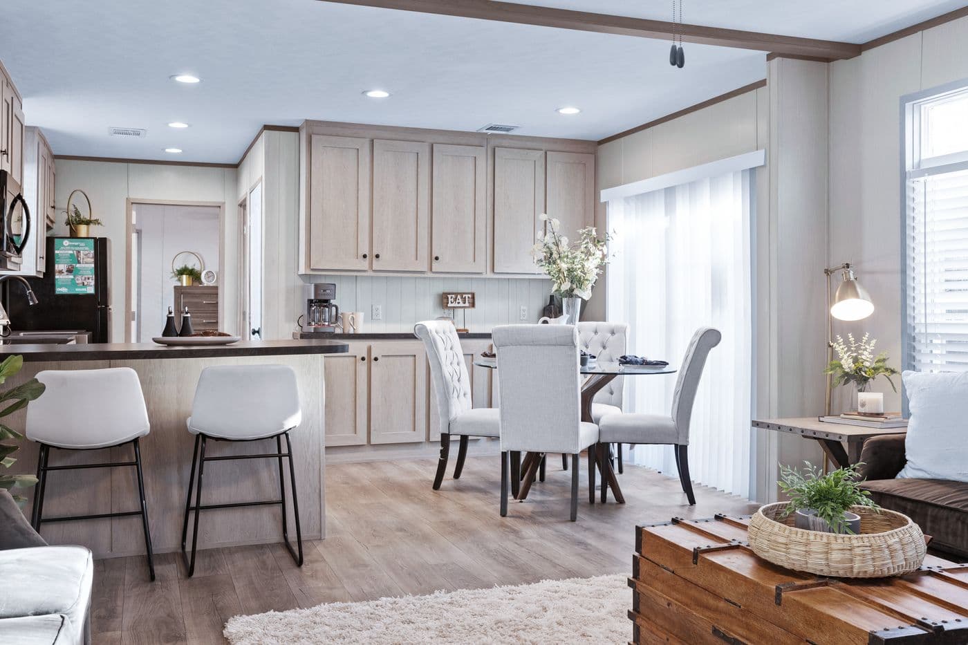 The ANNIVERSARY 16763A Living Room. This Manufactured Mobile Home features 3 bedrooms and 2 baths.