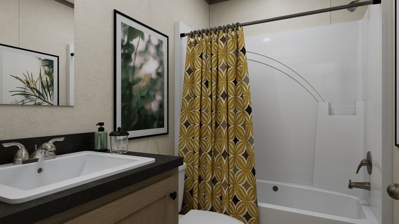 The 7016-CC03 HARBORVIEW 70 Guest Bathroom. This Manufactured Mobile Home features 3 bedrooms and 2 baths.
