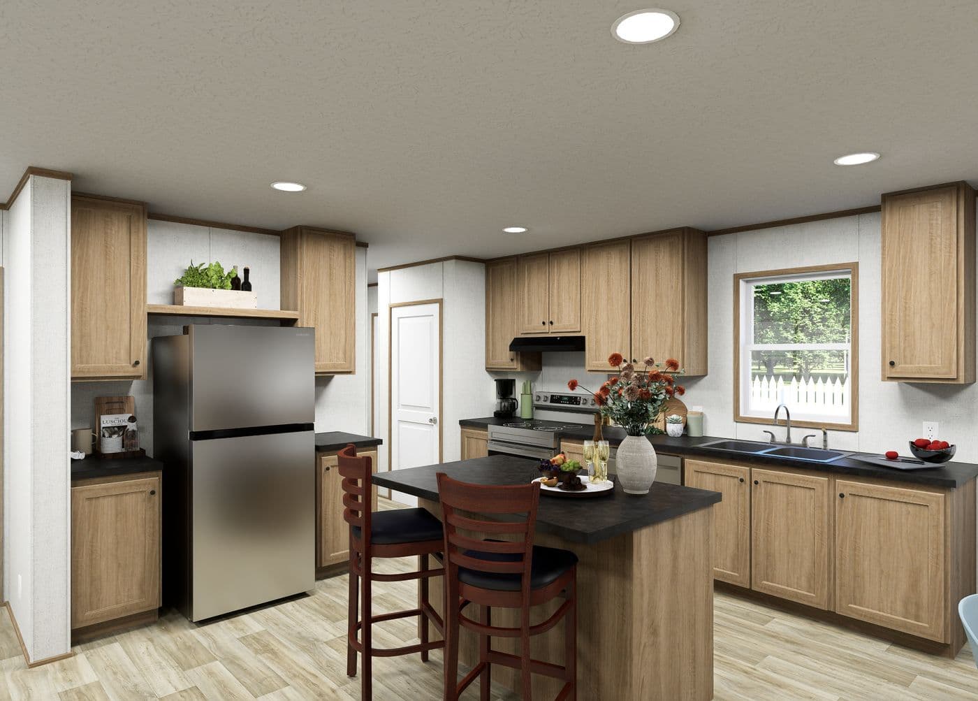 The VISTA  28X48 Kitchen. This Manufactured Mobile Home features 3 bedrooms and 2 baths.