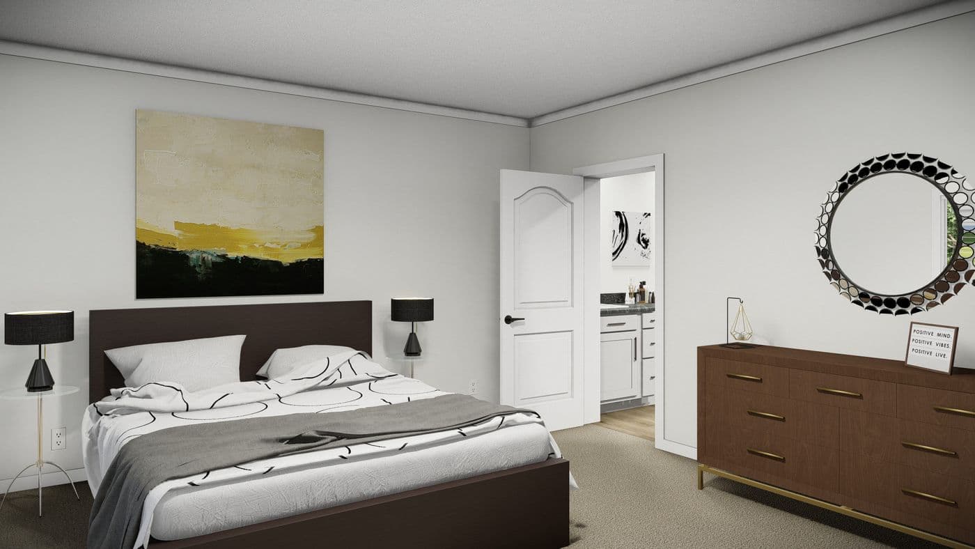The THE PARKER Primary Bedroom. This Manufactured Mobile Home features 3 bedrooms and 2 baths.